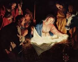 Nativity scene with a bright light coming from baby Jesus